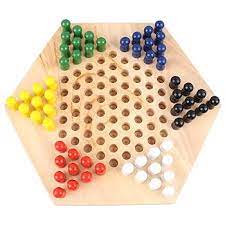 Hexagonal wooden board game with colored beads on a white background